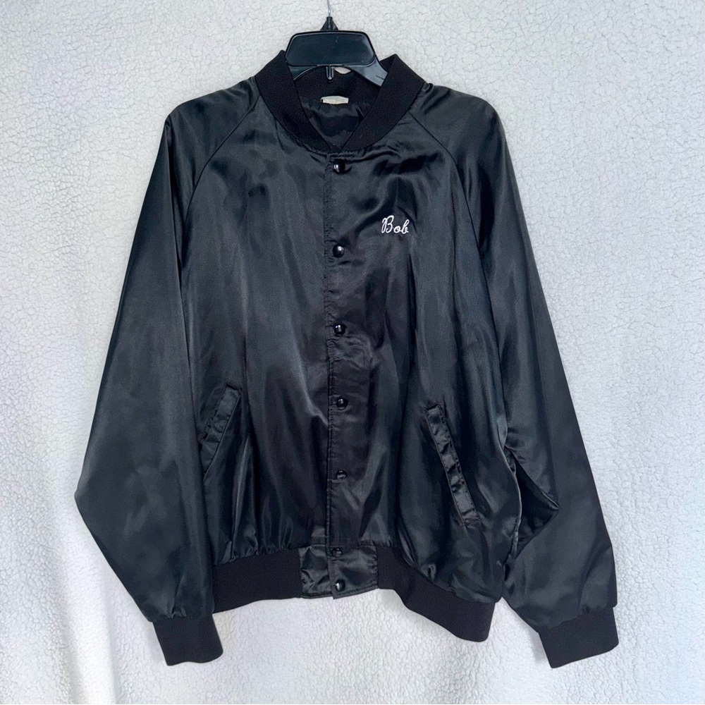 Pristine ‘90s shiny black Tour jacket, snap front, ribbed trim, customized